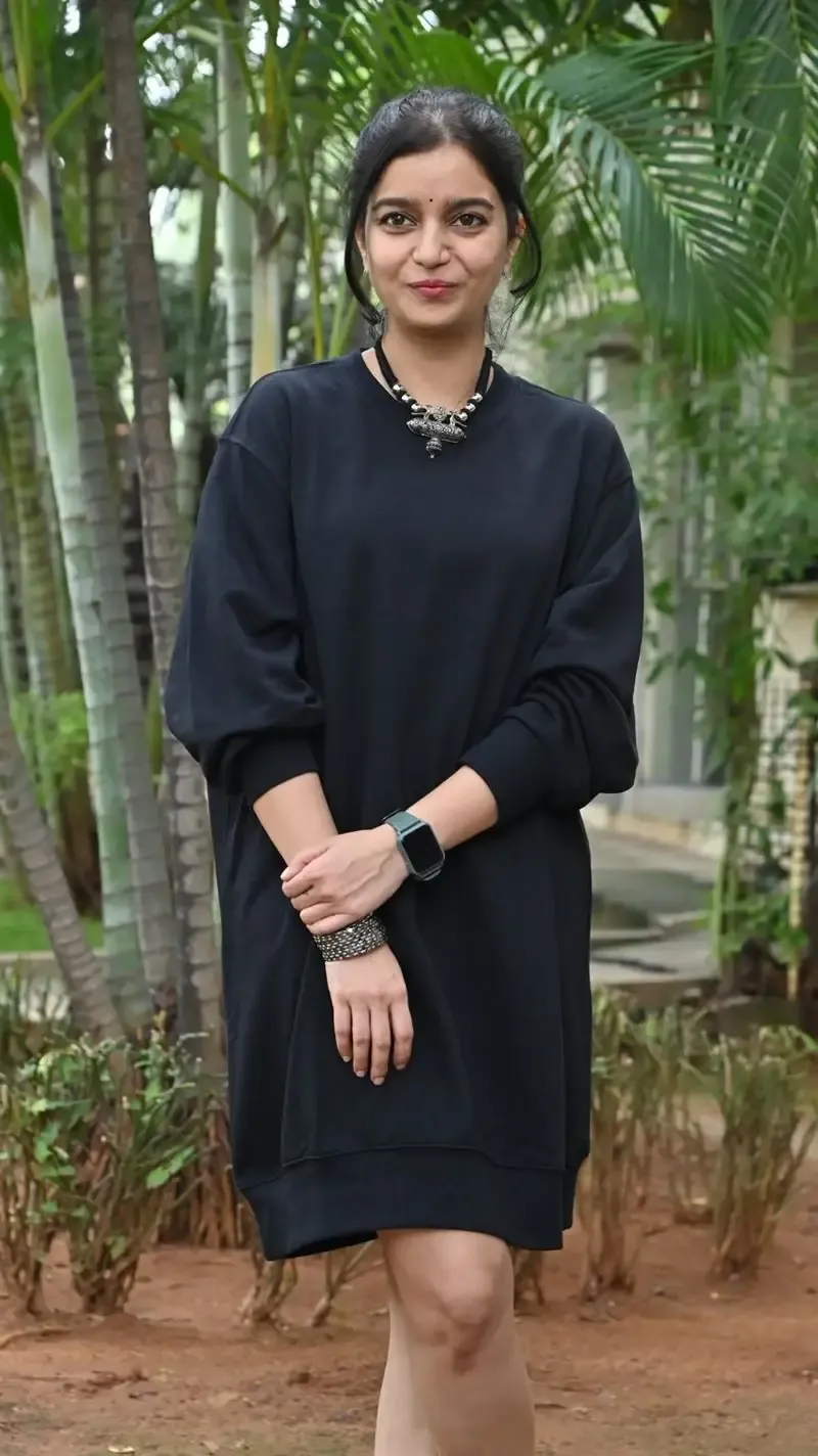 Actress Colors Swathi in Black Dress at Month Of Madhu Movie Press Meet